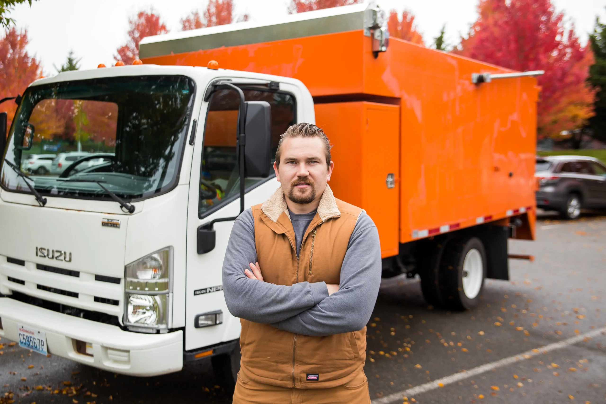 Martin Silch, the founder and local owner of M&M Junk Removal, standing proudly in front of his truck, providing trusted junk hauling services across Pierce and South King County, including Tacoma.